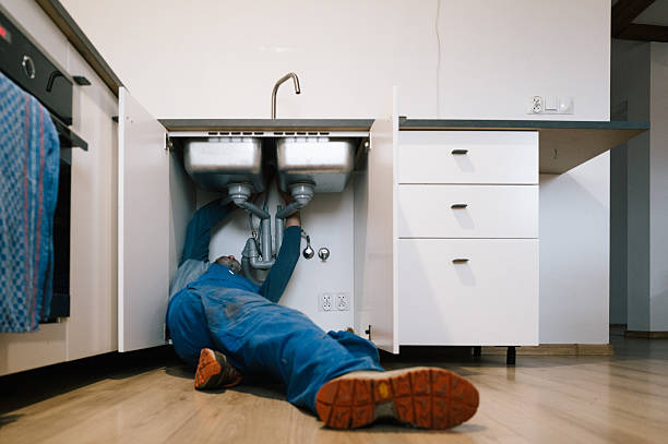 Professional Emergency Plumber technician working in Pewaukee, WI